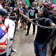 White nationalists, neo-Nazis and members of the “alt-right” exchange insults with counterprotesters as they attempt to guard the entrance to Emancipation Park during the Unite the Right rally Aug. 12, 2017, in Charlottesville, Va. (Chip Somodevilla/Getty Images)